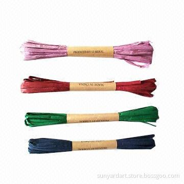 Paper raffia ribbon on plastic spool/paper string
